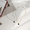 Gold/Silver Studded Necklace with Deep Black Pendant